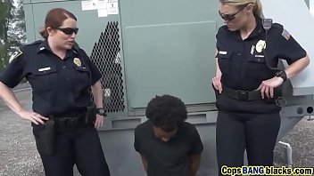 Black man arresting pulis woman