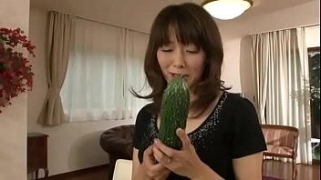 Masturbating with a cucumber