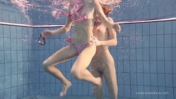 Hot lesbians on swimming pool