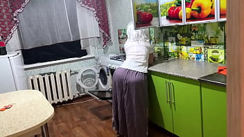 Mom lets her son grind her hot ass while standing in the kitchen